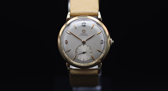 Omega - Gold hammer automatic 1947
